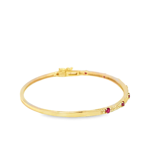 Brazalete en oro amarillo de 14K con diamante de 0.27CT y rubí de 0.48CT