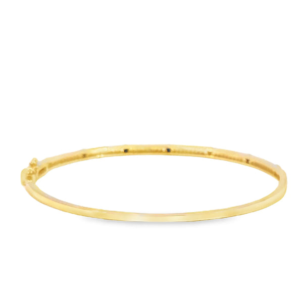 Brazalete en oro amarillo de 14K con diamante de 0.28CT y zafiro de 0.52CT