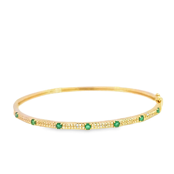 Brazalete en oro amarillo de 14K con diamante de 0.28CT y esmeralda de 0.38CT