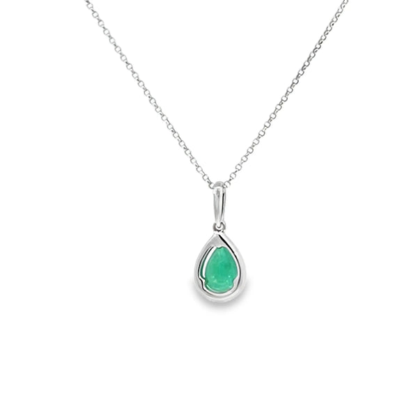 Dije con cadena en oro blanco de 14K con diamante de 0.08CT y esmeralda de 0.56CT