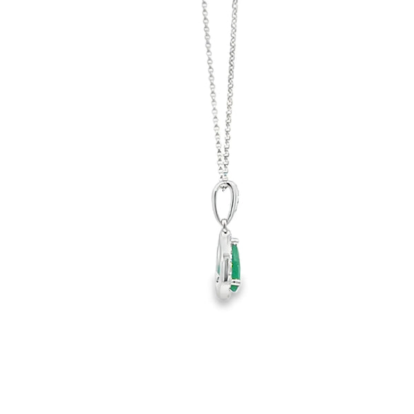 Dije con cadena en oro blanco de 14K con diamante de 0.08CT y esmeralda de 0.56CT