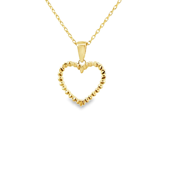 Dije con cadena en oro amarillo de 14K con esmeralda corazon de 0.13 ct