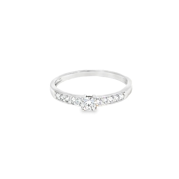 Anillo solitario en oro blanco de 14K con un diamante de 0.30 ct