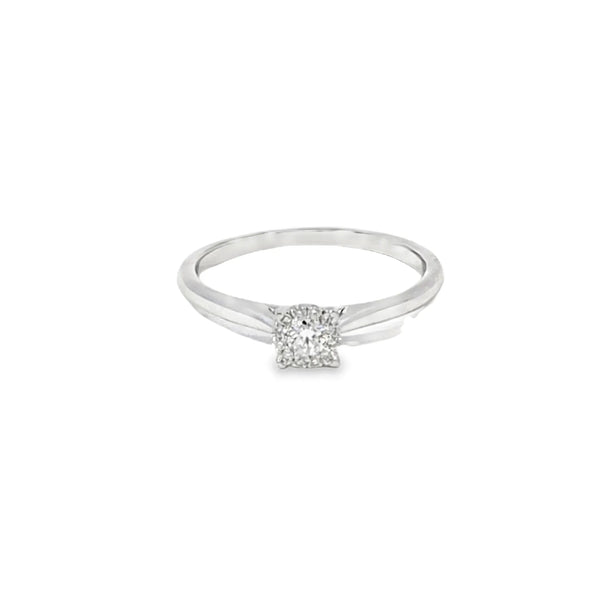 Anillo solitario en oro blanco de 14K con un diamante de 0.15 ct