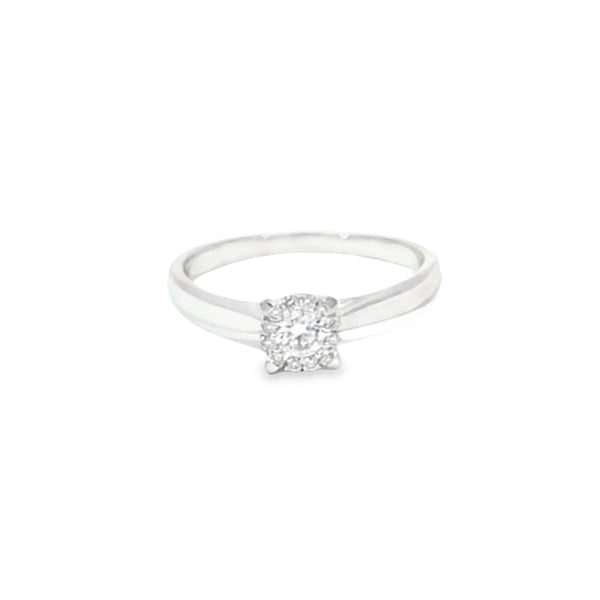 Anillo solitario en oro blanco de 14K con un diamante de 0.25 ct