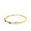 Brazalete en oro amarillo de 14K con diamante de 0.24CT y topacio azul
