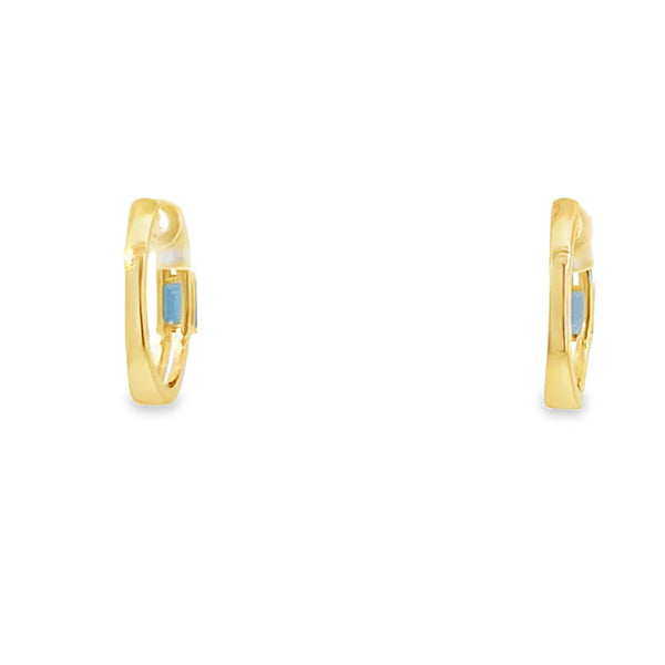 Aretes en oro amarillo de 14K con diamante de 0.15CT y topacio azul de 0.65CT