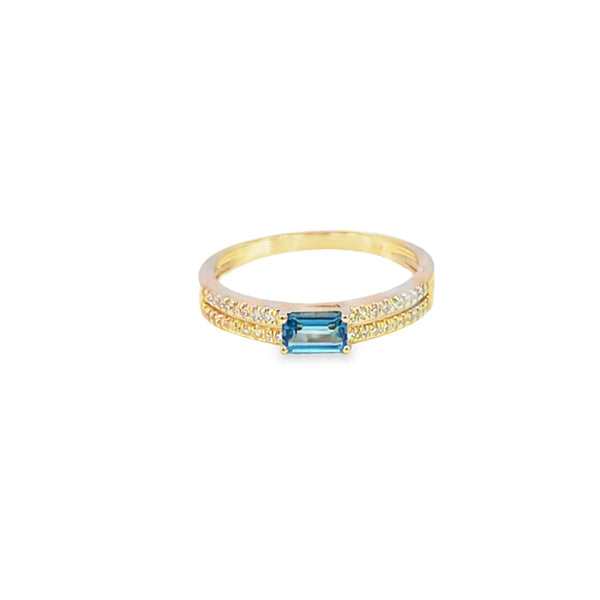 Anillo dama en oro amarillo de 14K con diamante de 0.10CT y topacio azul de 0.31CT