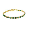 Brazalete en oro amarillo de 14K con diamantes de 0.31 ct y esmeralda de 10 ct