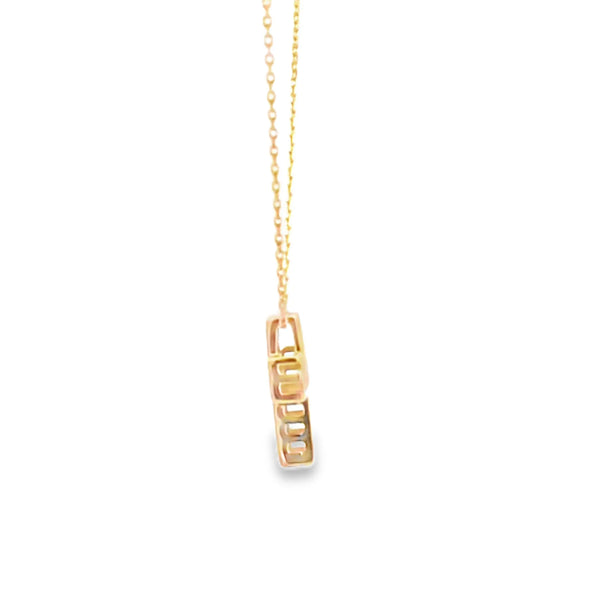 Cruz con cadena en oro amarillo de 14K con 0.06 ct en diamante H SI1