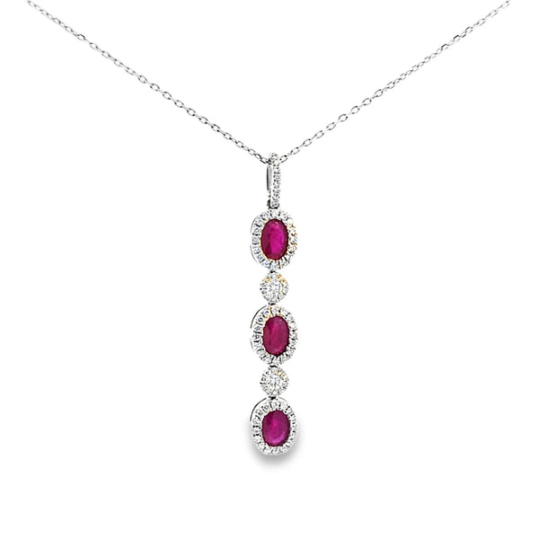 Dije con Cadena en 14K en Oro Blanco con 0.47CT en Rubíes