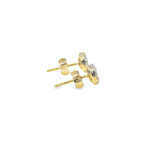 Broquel Brillante en Oro Amarillo de 14K con Diamante de 0.68 ct, calidad H VS1.