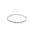 Brazalete en oro blanco de 14K con 1.80 ct de diamantes y esmeraldas