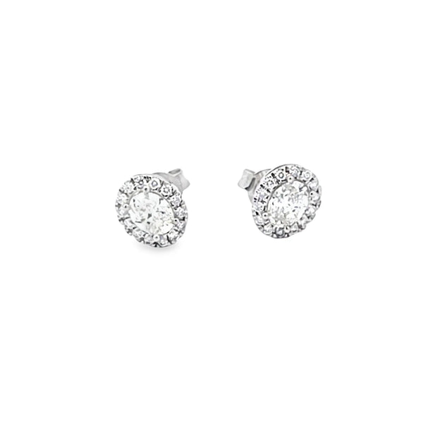 Aretes en oro blanco de 14K con diamantes ovalados de 0.74 ct