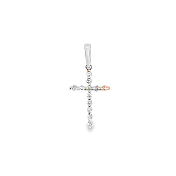 Cruz en oro blanco de 14K con diamantes de 0.19 ct, símbolo de devoción y lujo