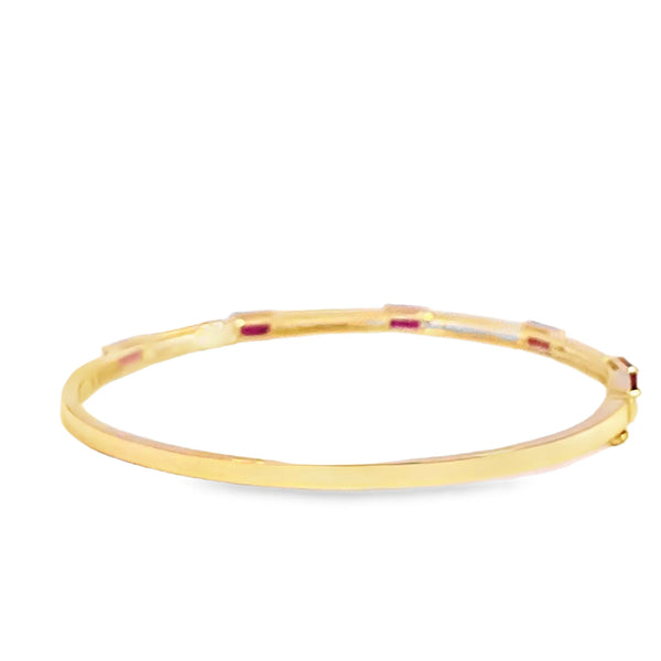 Brazalete en oro amarillo de 14K con diamante de 0.25CT y rubí de 1.49CT