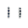 Aretes en oro blanco de 18K con diamante de 0.18CT y zafiro de 1.25CT