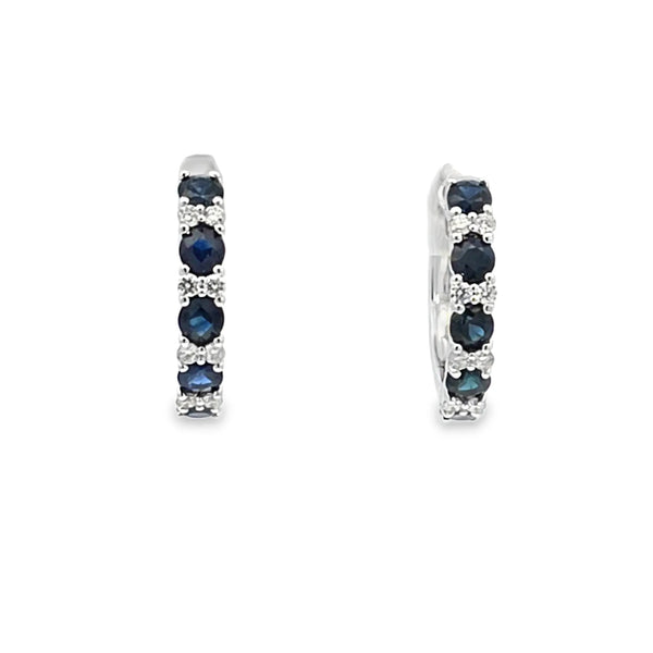 Aretes en oro blanco de 18K con diamante de 0.18CT y zafiro de 1.25CT