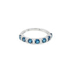 Anillo dama en oro blanco de 14K con diamante de 0.14CT y topacio London Blue de 0.96CT