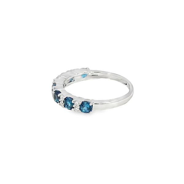 Anillo dama en oro blanco de 14K con diamante de 0.14CT y topacio London Blue de 0.96CT