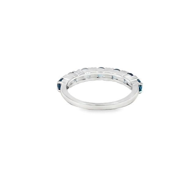 Anillo dama en oro blanco de 14K con diamante de 0.14CT y topacio London Blue de 0.96CT