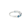 Anillo dama en oro blanco de 14K con diamante de 0.14CT y topacio London Blue de 0.96CT