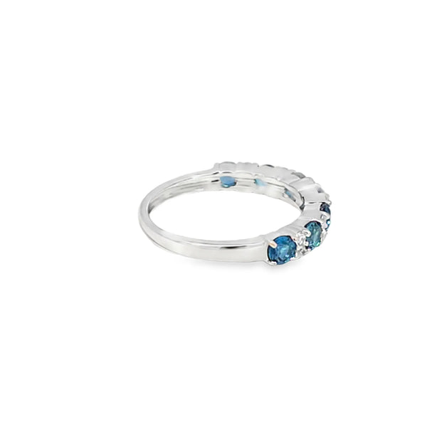Anillo dama en oro blanco de 14K con diamante de 0.14CT y topacio London Blue de 0.96CT