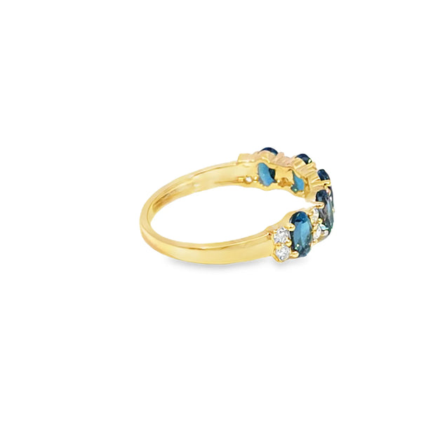 Anillo dama en oro amarillo de 14K con diamante de 0.27CT y topacio London Blue de 1.54CT