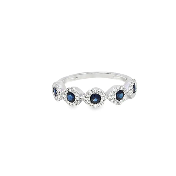 Anillo dama en oro blanco de 14K con diamante de 0.21CT y zafiro de 0.54CT