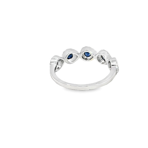 Anillo dama en oro blanco de 14K con diamante de 0.21CT y zafiro de 0.54CT