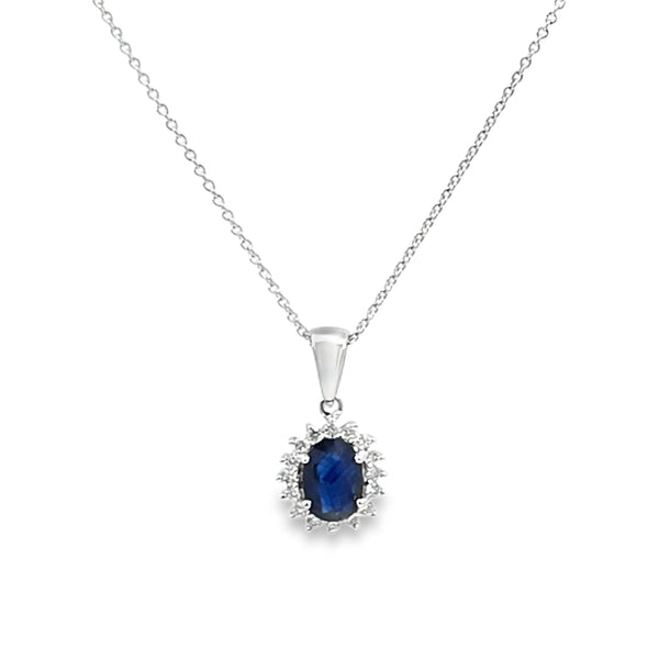 Dije con cadena en oro blanco de 14K con diamante de 0.14CT y zafiro de 0.92CT