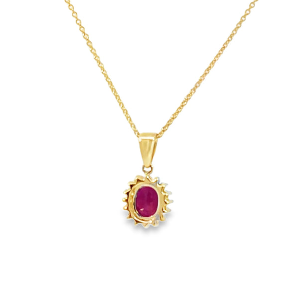Dije con cadena en oro amarillo de 14K con diamante de 0.14CT y rubí de 0.96CT