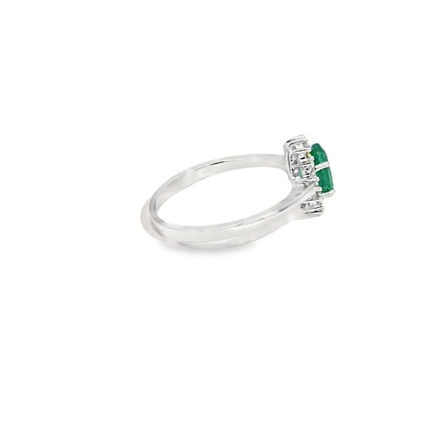 Anillo dama en oro blanco de 14K con diamante de 0.14CT y esmeralda de 0.77CT