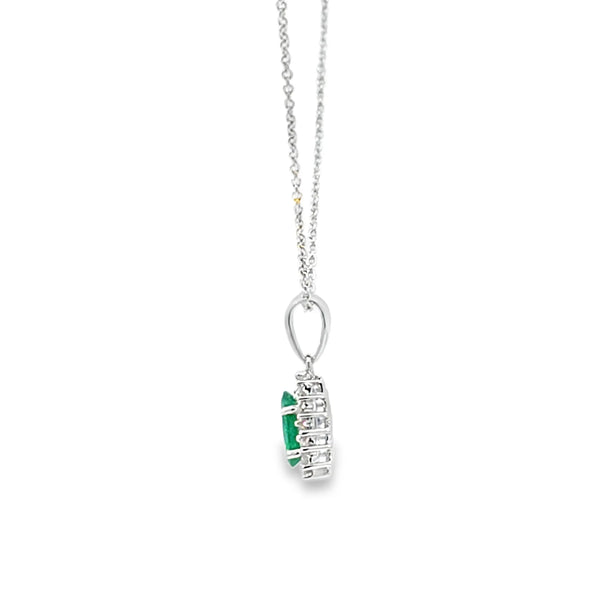 Dije con cadena en oro blanco de 14K con diamante de 0.14CT y esmeralda de 0.62CT