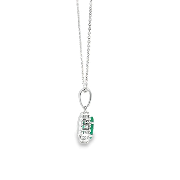 Dije con cadena en oro blanco de 14K con diamante de 0.14CT y esmeralda de 0.62CT
