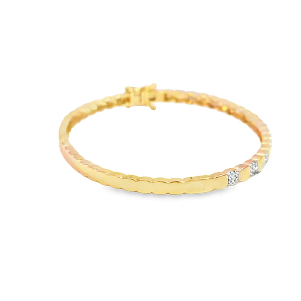 Brazalete en oro amarillo de 14K con diamante de 0.34CT