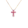 Cruz con cadena en oro de 14K con diamante de 0.76 ct y zafiro rosa