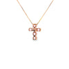 Cruz con cadena en oro de 14K con diamante de 0.76 ct y zafiro rosa