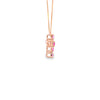 Cruz con cadena en oro de 14K con diamante de 0.76 ct y zafiro rosa