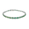 Brazalete en oro blanco de 14K con diamantes de 0.31 ct y esmeraldas de 10.01 ct