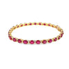 Brazalete en oro amarillo de 14K con diamantes de 0.31 ct y rubís de 10 ct