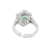 Anillo para dama en oro blanco de 14K con diamantes de 0.97 ct y esmeralda de 1.24 ct