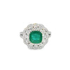 Anillo para dama en oro blanco de 14K con diamantes de 1.21 ct y esmeralda de 2.70 ct