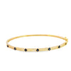 Brazalete en oro amarillo de 14K con diamante de 0.28CT y zafiro de 0.52CT