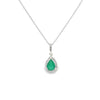 Dije con cadena en oro blanco de 14K con diamante de 0.08CT y esmeralda de 0.56CT