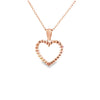 Dije con cadena en oro rosa de 14K con rubí forma de corazón de 0.13 ct