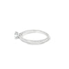 Anillo solitario en oro blanco de 14K con un diamante de 0.20 ct