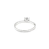 Anillo solitario en oro blanco de 14K con un diamante de 0.25 ct