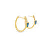 Aretes en oro amarillo de 14K con diamante de 0.15CT y topacio azul de 0.65CT