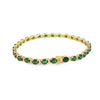 Brazalete en oro amarillo de 14K con diamantes de 0.31 ct y esmeralda de 10 ct